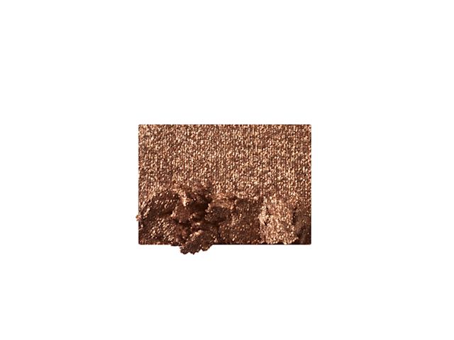 Swatch of a shimmery dark golden eyeshadow. 