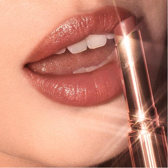  Superstar Lips Lip Gloss model's lips