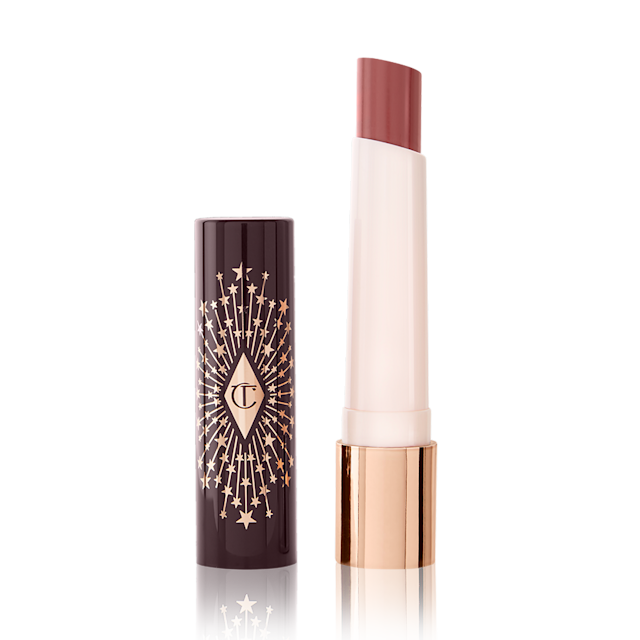 Hyaluronic Happikiss Lippenstift-Balsam in Pink-Nude-Ton Pillow Talk mit abgenommenem Deckel