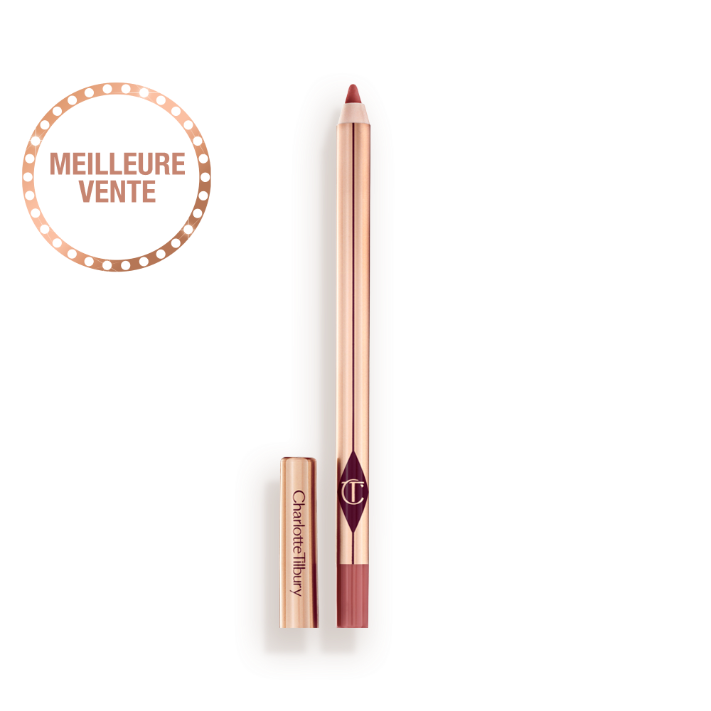Crayon à lèvres rose nude de taille standard sans bouchon et avec un extérieur réfléchissant de couleur dorée. 