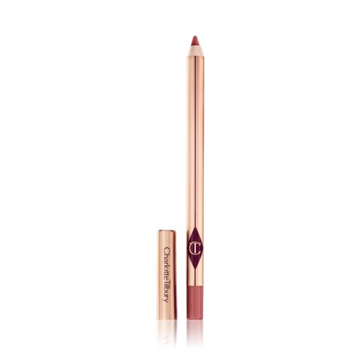 A standard-sized, nude-pink lip liner pencil with its lid removed, with a reflective, golden-coloured exterior. 