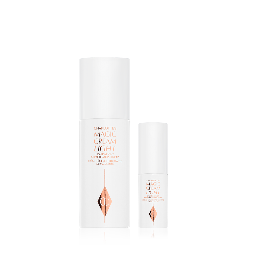 Light, pearly-white face creams in full-size and travel-size bottles. 