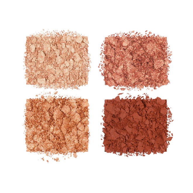 Four, crushed, shimmery eyeshadows in shades of copper, rust, champagne, and bronze. 