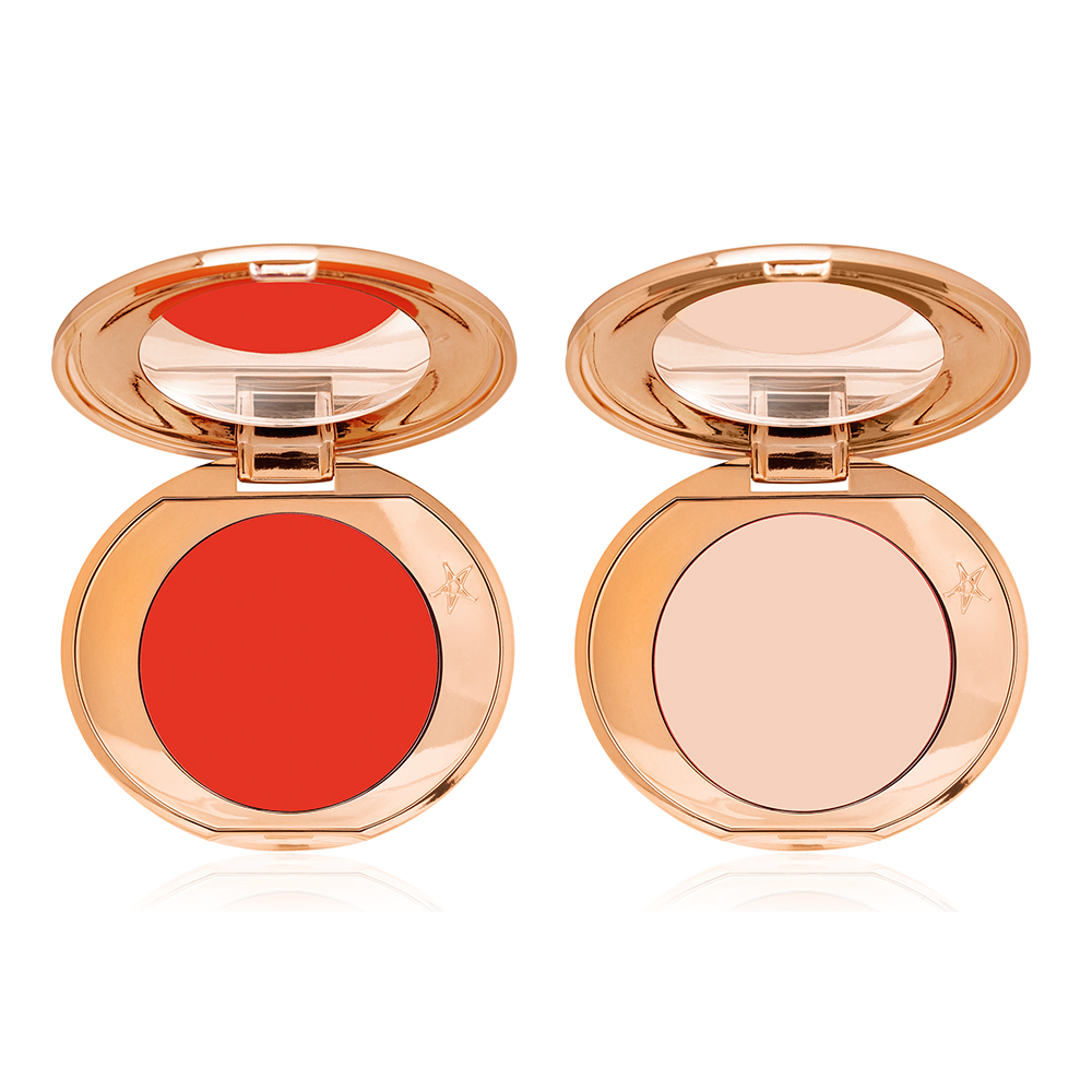 Two colour-correcting compacts for light and deep tones with mirrored-lids and gold-colour packaging. 