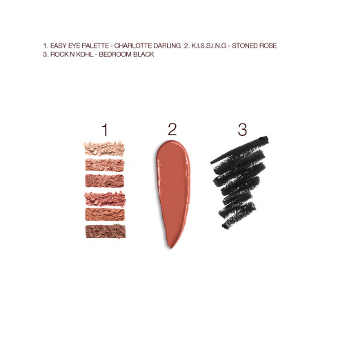Swatches of six eyeshadows in shades of brown, golden, and beige, satin-finish lipstick in orange-brown, and kohl eyeliner in black.