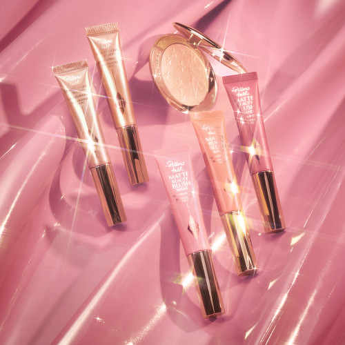 Charlotte's liquid blush and highlighter wands in Pillow Talk-inspired shades
