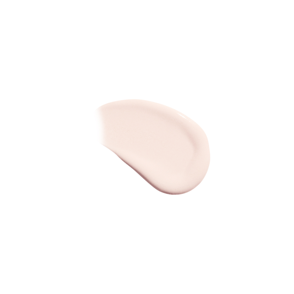 Close-up of a creamy light beige concealer swatch with a smooth texture on a white background.