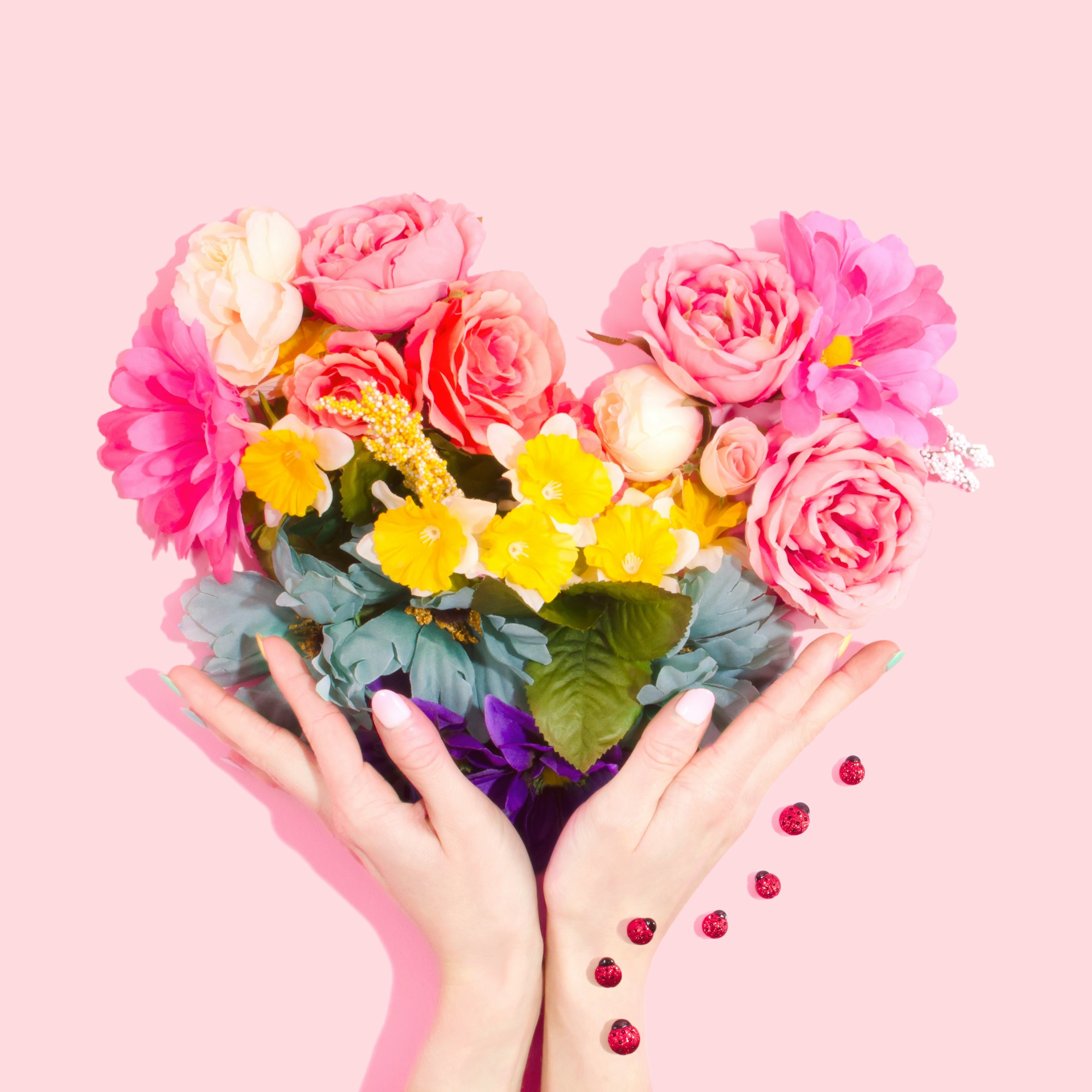Bouquet of flowers in a heart shape representing Valentine's Day self-love and confidence