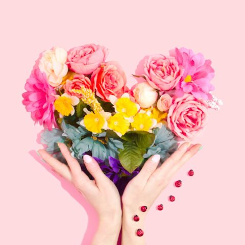 Bouquet of flowers in a heart shape representing Valentine's Day self-love and confidence