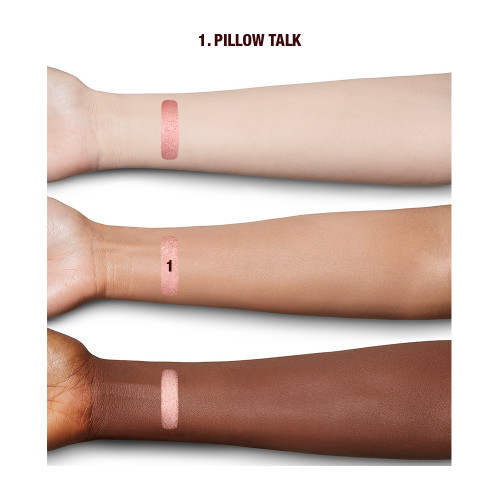 Fair, tan, and deep-tone arms with swatches of a metallic, nude pink eyeshadow.