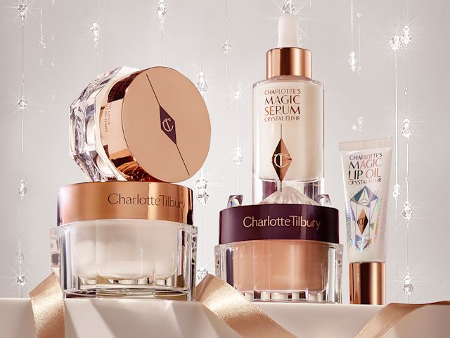 Pearly-white face cream, copper-coloured night cream, and dark champagne eye cream, all in glass jars with a luminous, ivory-coloured face serum in a glass bottle with a dropper lid, and an eye serum in a white and gold tube.