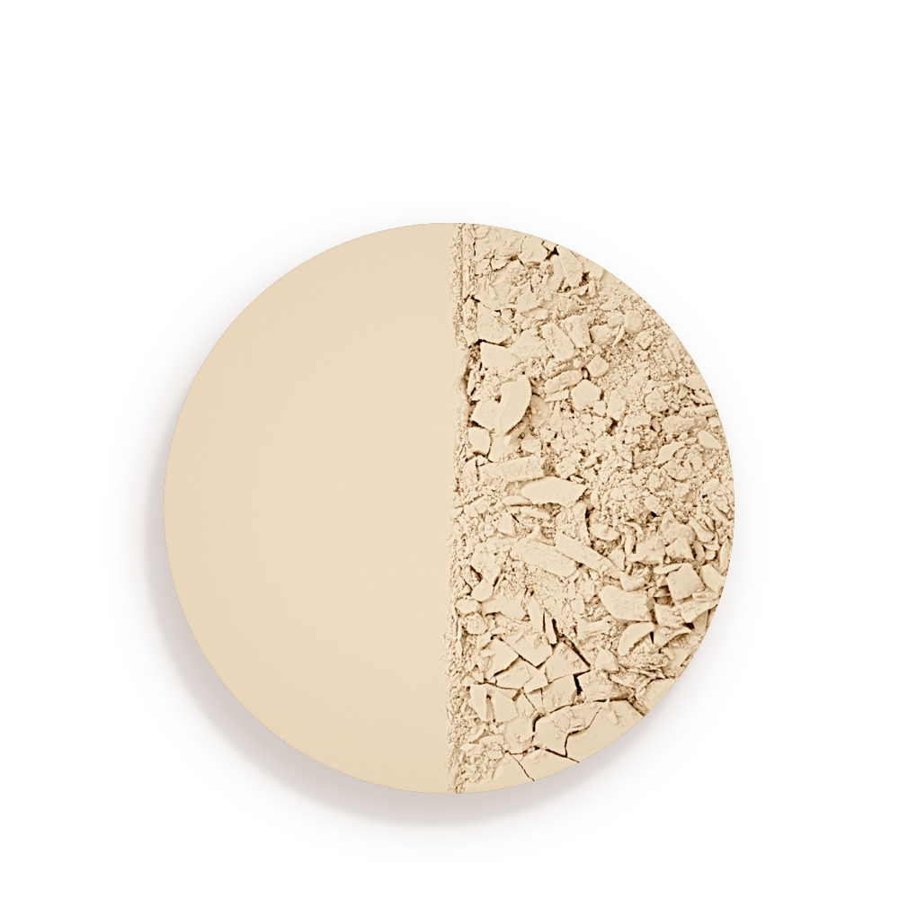 Swatch of a cream-coloured setting powder compact.