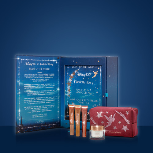 Disney100 x Charlotte Tilbury DISNEY100 X CHARLOTTE TILBURY GIFT SET
 open with products sitting at the front of the box.