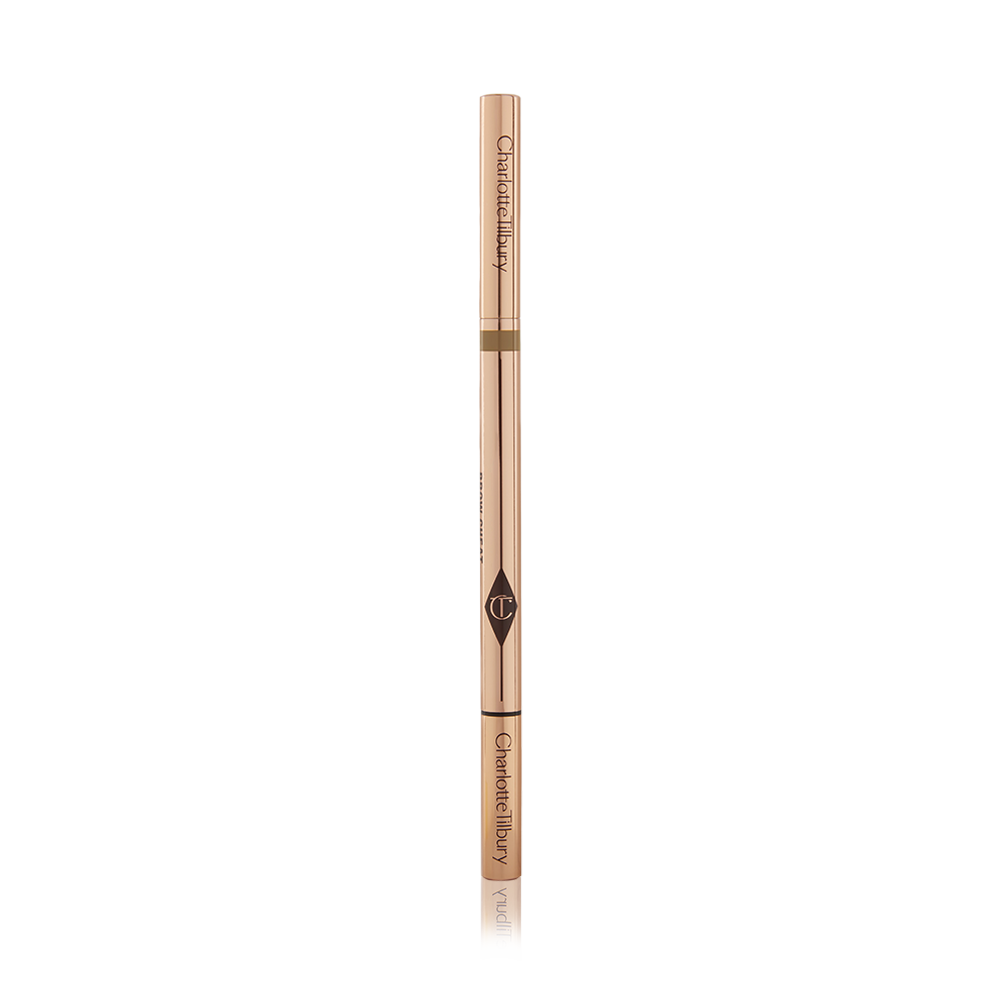 A closed, double-ended eyebrow pencil and spoolie brush in gold-coloured packaging.