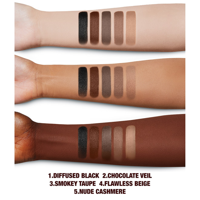 Deep, tan, and fair-tone arms with swatches of five cream eyeshadows with a matte finish in soft cashmere, light grey-brown, chocolate brown, smokey taupe, and jet black.