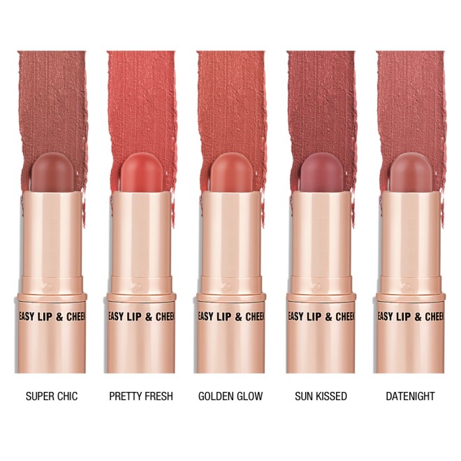 Five, open, lip and cheek colour sticks in glowy brown-pink, nude-pink, coral, nude-rose, and soft pink shades. 