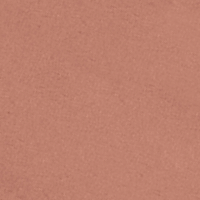 Swatch of a soft taupe lipstick with a matte finish. 