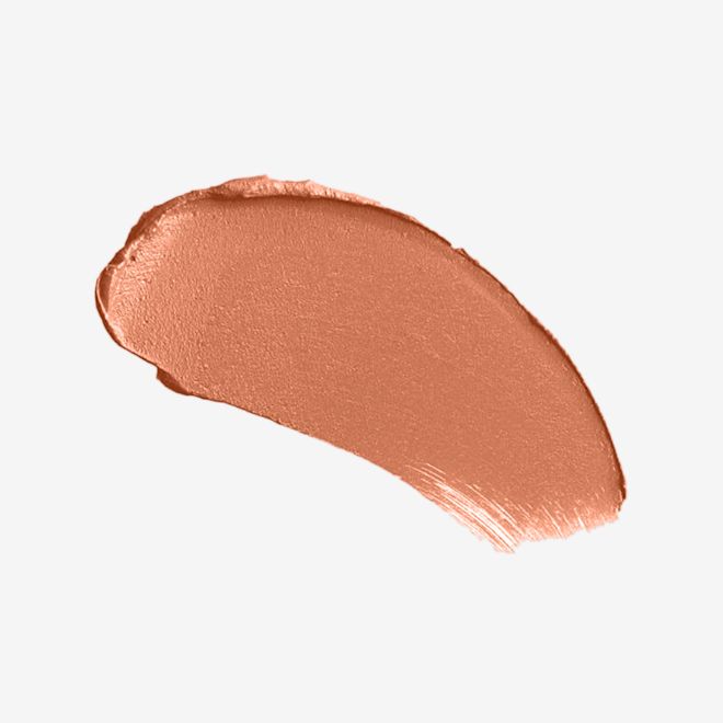 Matte Revolution The Super Nudes in Cover Star swatch Swatch of a muted apricot lipstick with a matte finish.