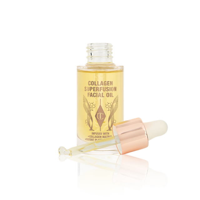 Light-gold-coloured facial oil in an open glass bottle with a gold and white-coloured dropper lid.