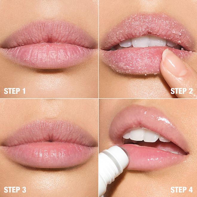 Charlotte's Magic Lip Scrub routine on fair-tone lips close-up Lips close-up of a fair-tone model doing her lips routine that includes applying a lip scrub on freshly cleansed lips, wiping it off, and then applying lip oil on the lips.