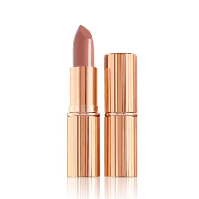 two lipsticks, with and without lid, in soft rosy peach shade with a satin finish in sleek gold-coloured packaging.