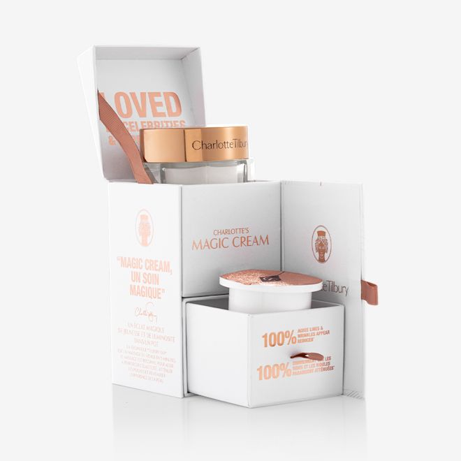 Magic Cream with refill bundle packed Pearly-white cream in a glass jar with a gold-coloured lid in its packaging box along with its refill in a white-coloured pot with an easy-to-peel-off cover, also in the same box.