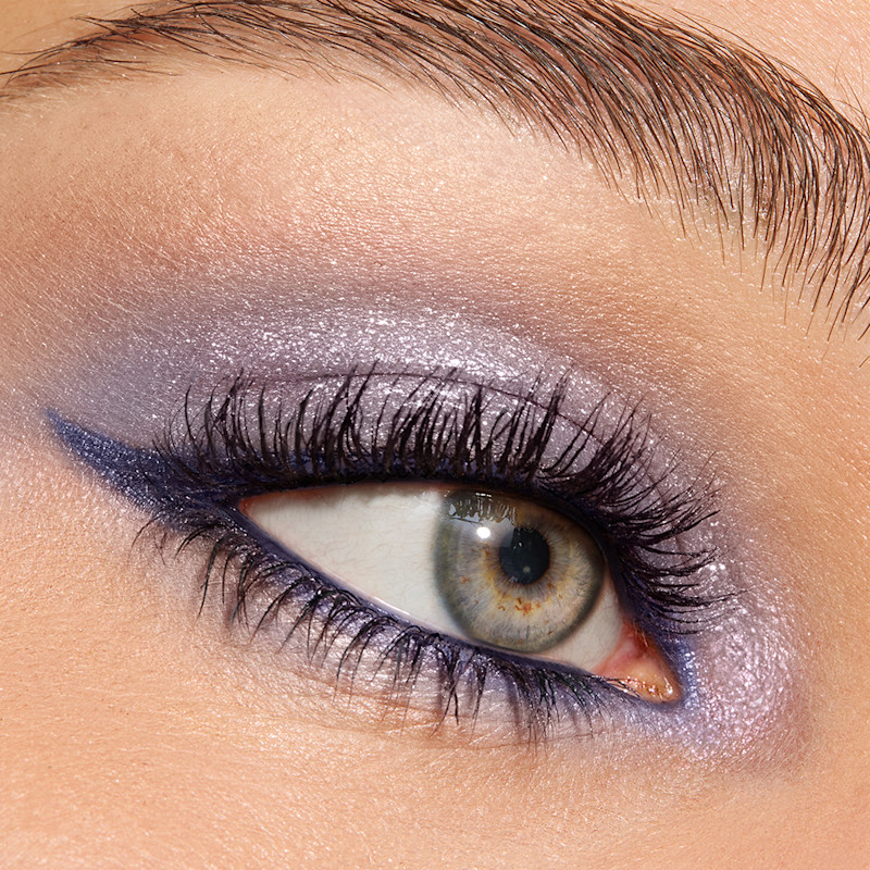 Model with blue eyes wearing Denim Dimension blue eyeshadow look