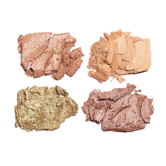 Swatches of a quad eyeshadow palette with four shimmery shades in champagne, soft gold, coppery-gold and soft bronze.