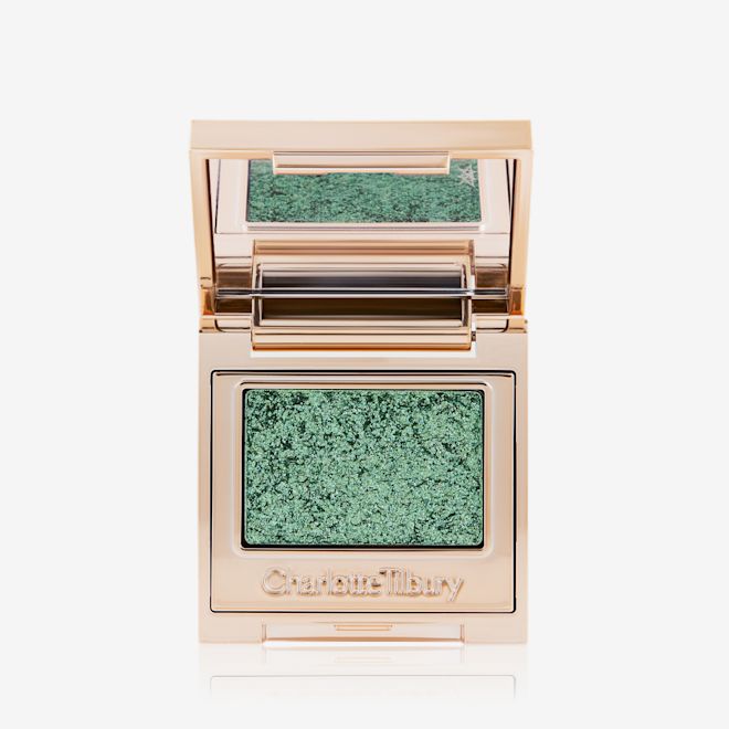 HYPNOTISING POP SHOT - EMERALD Single-pan eyeshadow compact with an iridescent emerald green eyeshadow with very fine shimmer.