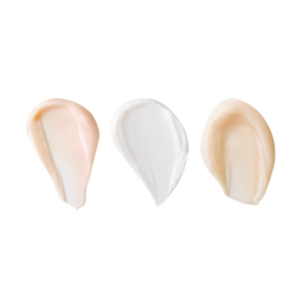 Swatches of champagne-coloured eye cream, pearly-white face cream, and fawn-coloured thick and luscious face cream.