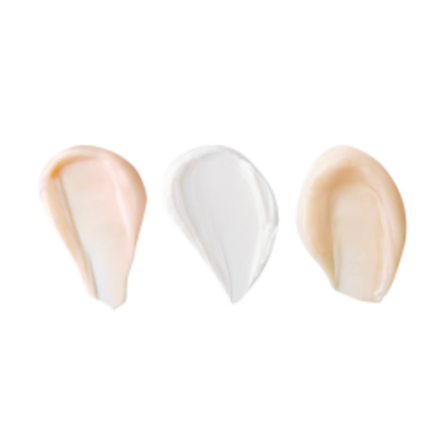 Swatches of champagne-coloured eye cream, pearly-white face cream, and fawn-coloured thick and luscious face cream.