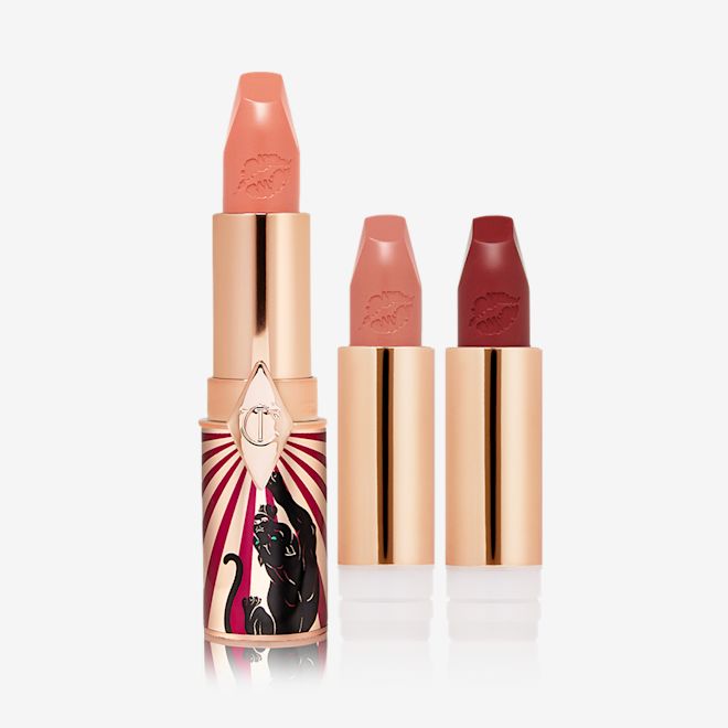 Hot Lips 2 Trio Magic Lip Kit A full-size soft peach satin-finish lipstick in a golden and red tube with a jaguar printed on it with two lipstick refills in nude peach and dark crimson,