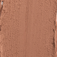 Swatch of an eyeshadow stick in a nude brown shade with a matte finish.