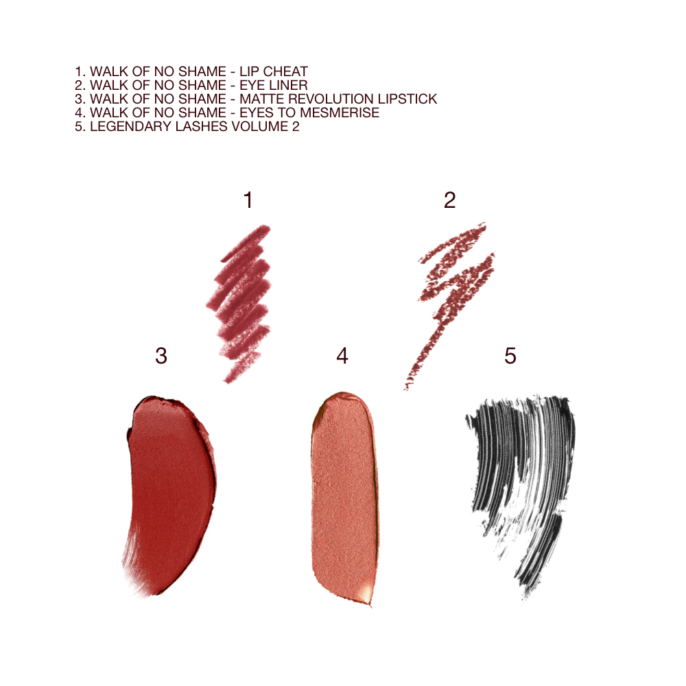 Swatches of a lip liner in berry red, eyeliner pencil in berry rose, matte lipstick in berry rose, cream eyeshadow in russet rose with gold sparkle, and black mascara.