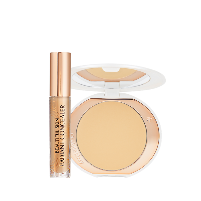 Concealer in a glass tube with a gold-coloured lid and a pressed powder in a banana yellow shade in a white-coloured compact. 