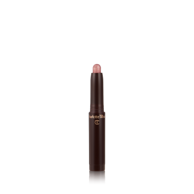 An open, cream eyeshadow wand in a dreamy pretty pink shimmer shade.