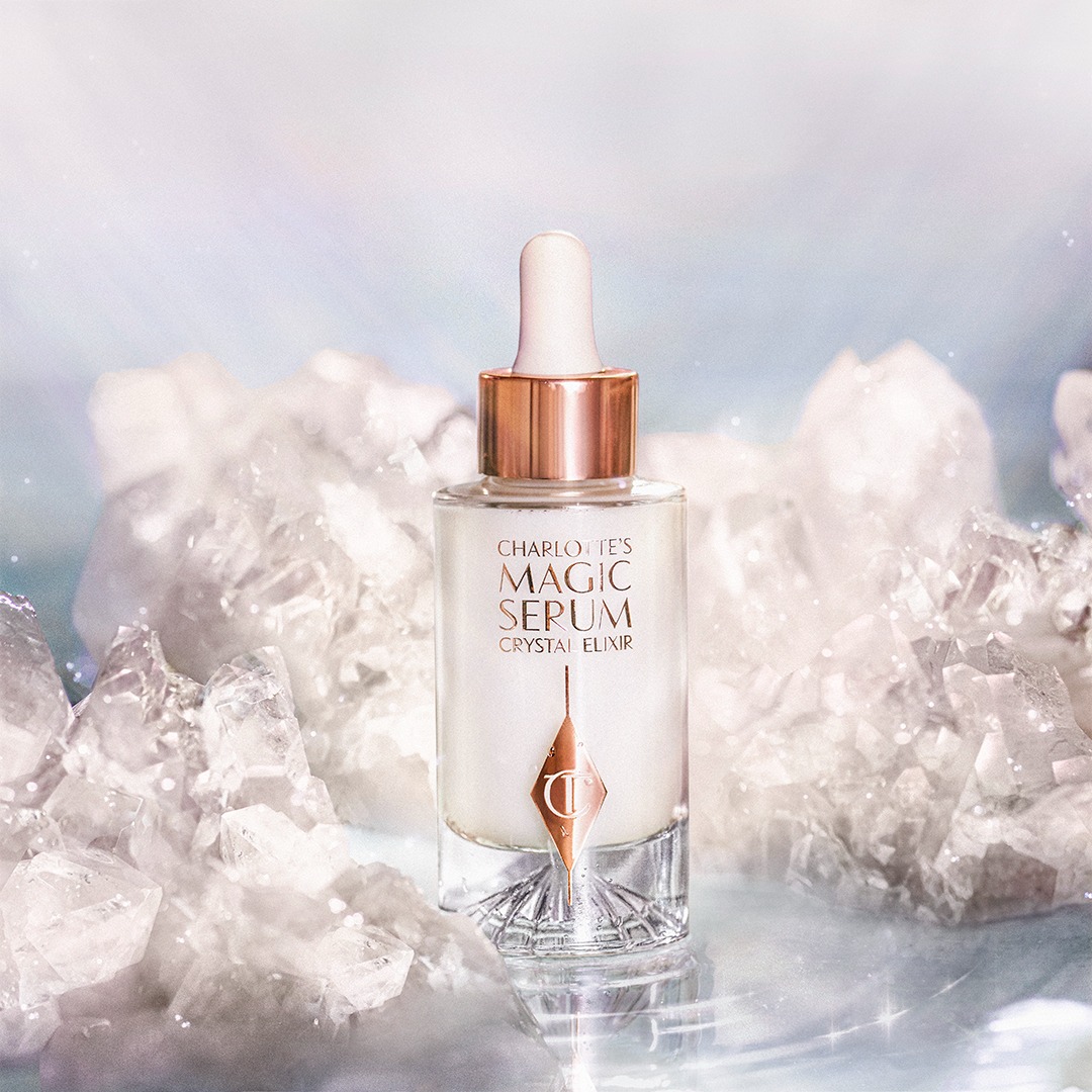 Charlotte's Magic Serum Crystal Elixir on a crystal backdrop
