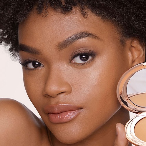 Compact powder for tan skin