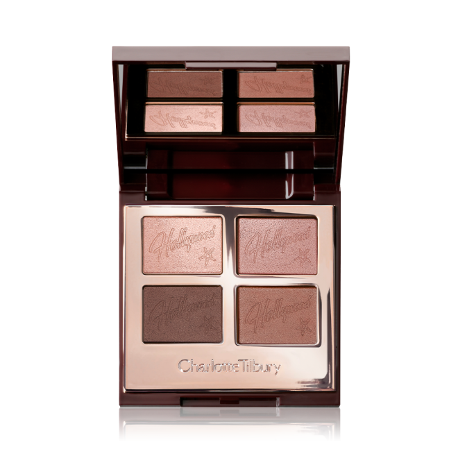 An open, mirrored-lid quad eyeshadow palette with shimmery and matte eyeshadows in pink champagne, metallic blush pink, mink brown and antiqued brown colours.