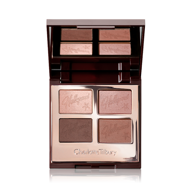 Hollywood Flawless Eye Filters in Star Aura open An open, mirrored-lid quad eyeshadow palette with shimmery and matte eyeshadows in pink champagne, metallic blush pink, mink brown and antiqued brown colours.