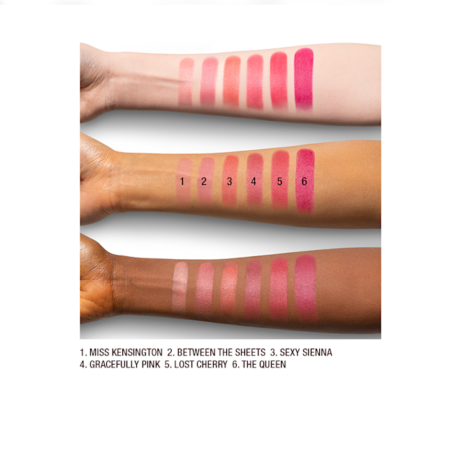 Fair, tan, and deep-tone arms with seven matte lipsticks in shades of pink and peach. 