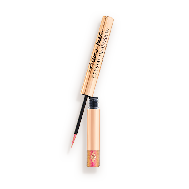 Pillow Talk Crystal Dimension Eyeliner open Glittery vivid, rose pink eyeliner in a gold-coloured tube with a black and gold-coloured, thin eyeliner wand.