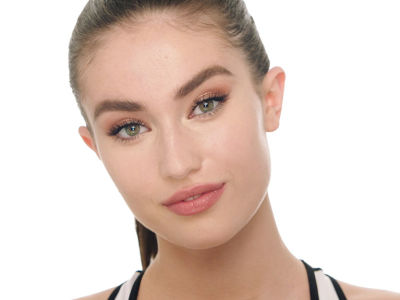 Close-up of a fair-tone model wearing fresh, natural-glam make-up. 