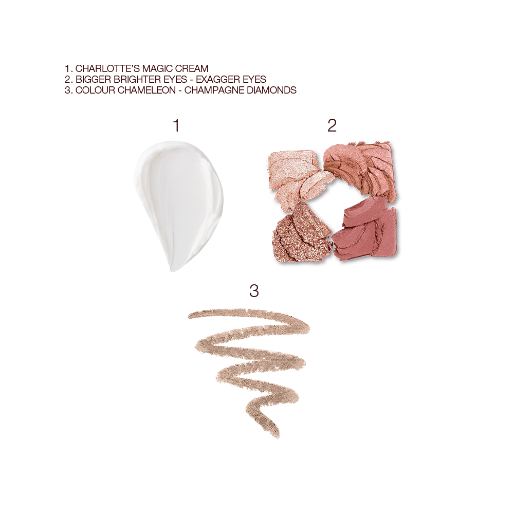 Swatch of a thick, pearly-white face cream, four eyeshadows in ivory-cream, rose-gold, red-brown, and clear sparkle, and eyeshadow in dark champagne. 