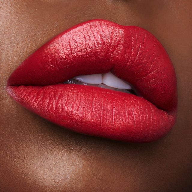 Pizzazz bright, cool-toned, blue-based red lipstick