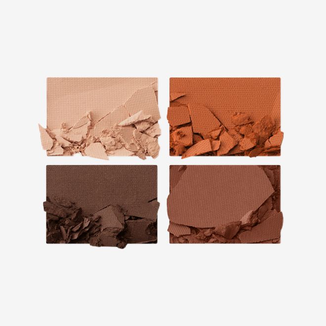 Luxury Palette Desert Haze swatch Swatches of four matte and shimmery eye shadows in shades of brown and champagne.