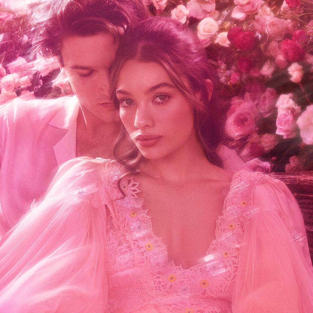 Two models on set for Charlotte's Love Frequency fragrance