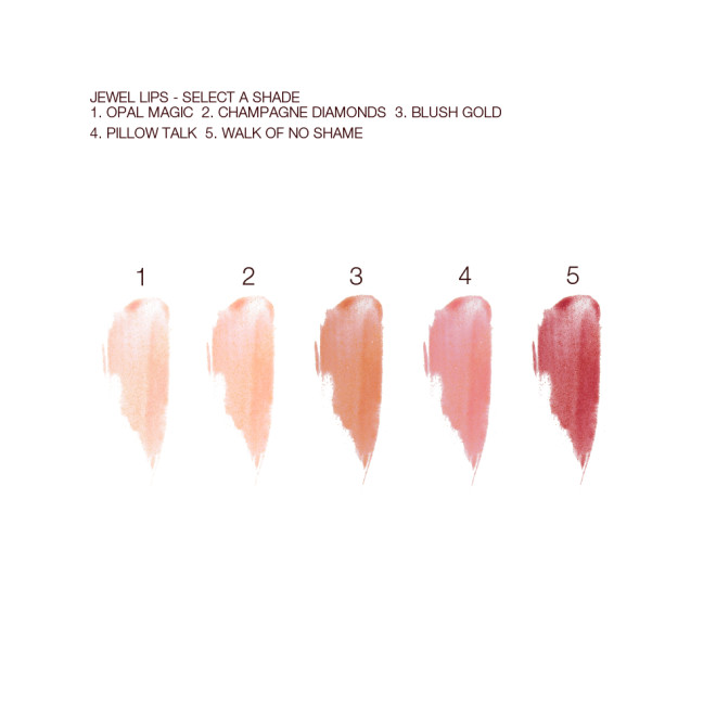 Swatches of five shimmery lip glosses in shades of peach, brown, pink, and red.