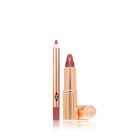 An open mini lipstick in a brown-pink colour with its lid next to it and a mini lip liner pencil in a matching shade.