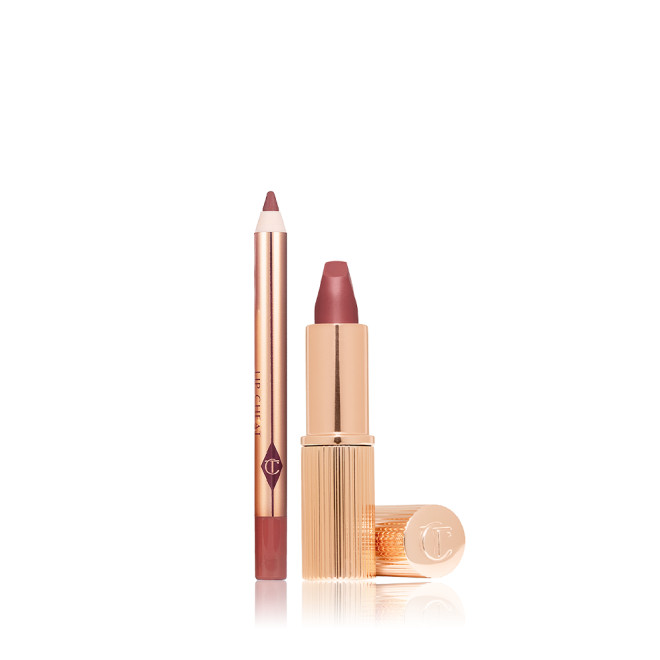 An open mini lipstick in a brown-pink colour with its lid next to it and a mini lip liner pencil in a matching shade.